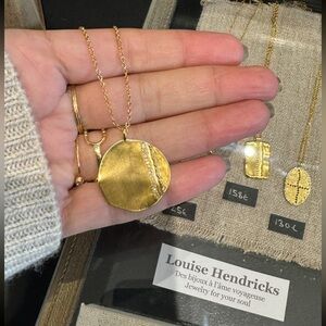 Gold fille medallion and long chain